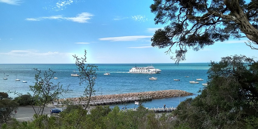 Peaceful hilltop park with floral displays overlooking the Dalkey coastline.