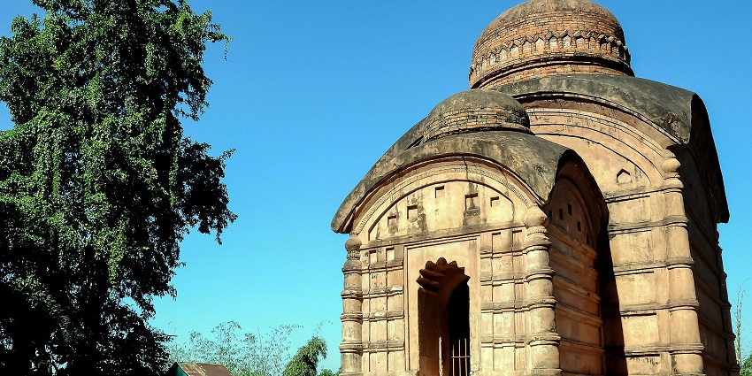 Devotees find peace at this hilltop temple surrounded by trees, silence, and scenic views.
