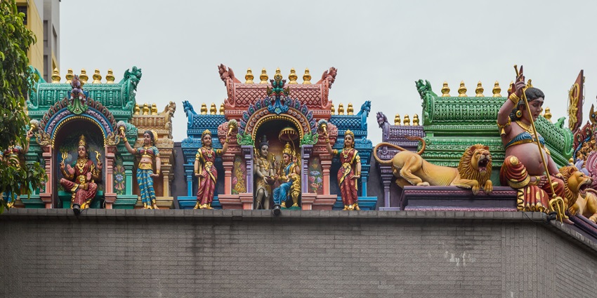 Colorful exterior of Sri Veeramakaliamman Temple with detailed sculptures, among the famous historical places in Singapore.