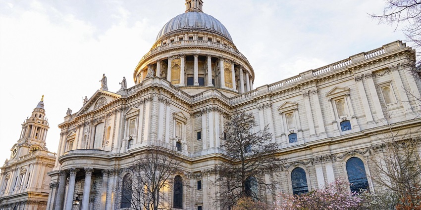 Scenic view of St Paul's Cathedral in London, featuring its iconic dome and towers, one of the top historical places in London.