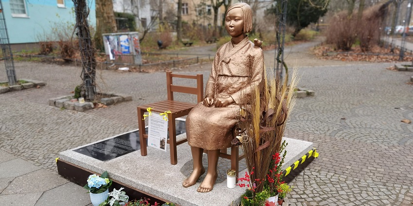 Statue of Peace honoring victims and promoting justice against crimes toward girls and women, symbolizing hope and remembrance.
