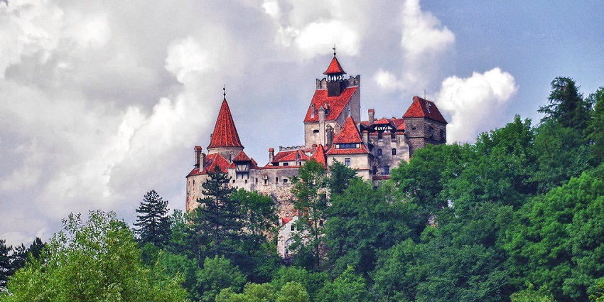 visiting Bran Castle, often linked to Dracula and perched dramatically on a hilltop i an unbelievable experience.