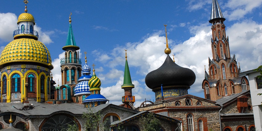Colourful domes in different shapes symbolise global religions in a unique art-focused structure.