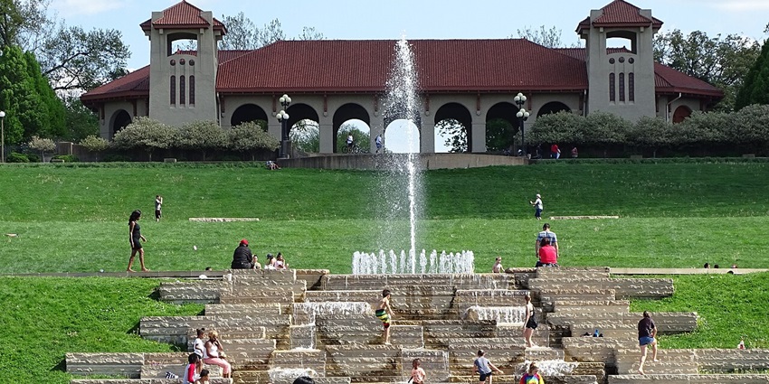 The expansive Forest Park, home to museums, lakes, and the famous fountain Scene