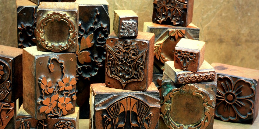 A collection of vintage and antique items displayed in a rustic shop setting.