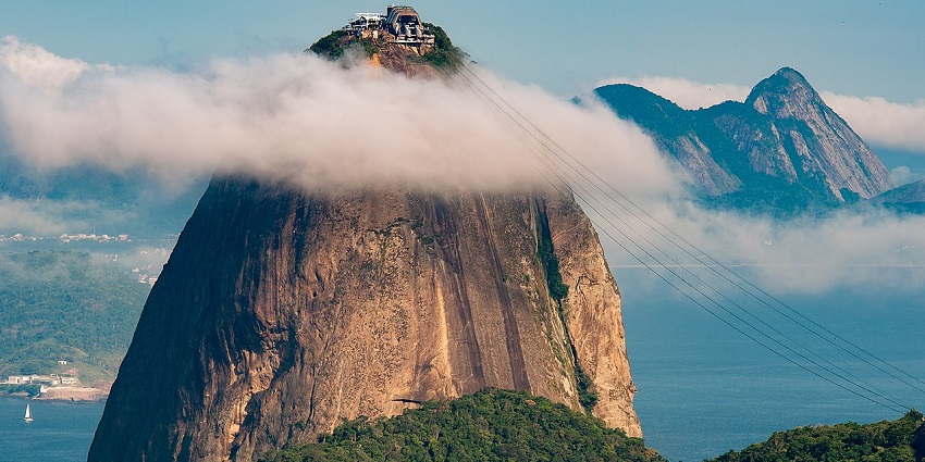 View of the Sugarloaf Mountain, wrapped in clouds, is a prominent monument in Brazil.