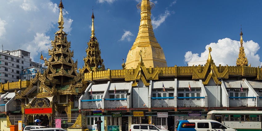 The Golden Pagoda, with its intricate spires rising above, is one of the top historical places in Yangon.
