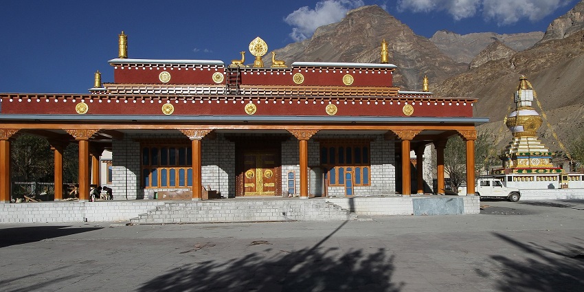 Monastery complex with traditional architecture set against an arid mountain landscape, one of the best places to visit in Lahaul and Spiti.
