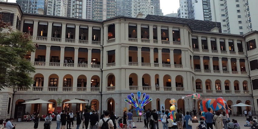 The courtyard of Tai Kwun features beautifully restored colonial buildings and hosts live performances.