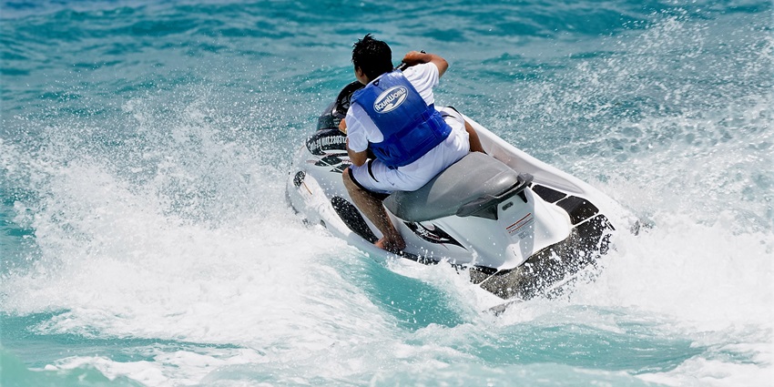 Jet skiers and boaters enjoy thrilling rides on Colorado River’s sparkling blue waters.