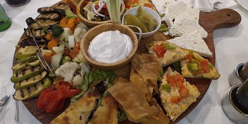 Savour traditional Albanian dishes in Shkodër, a city known for its rich culinary heritage.