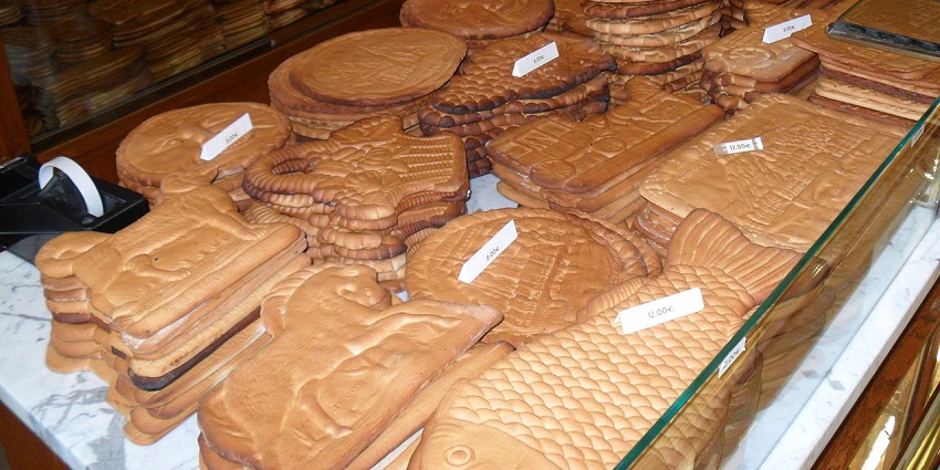 Close-up of traditional, intricately carved Dinant honey biscuit.