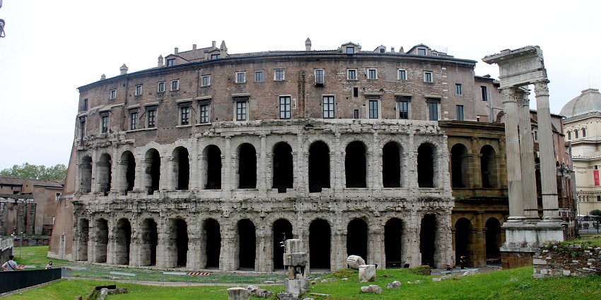 A grand Colosseum-like structure stands tall, upholding Rome’s great ancient culture.