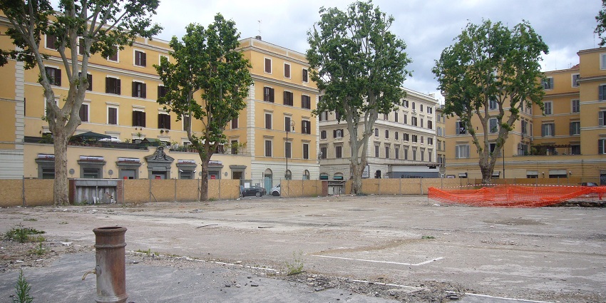 The deserted streets of the Testaccio Market with empty buildings during the evening.