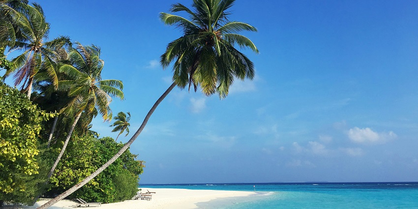 Tropical beach in dry season for those asking which month is best to visit Maldives
