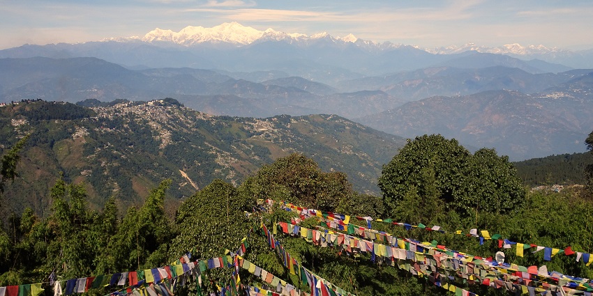 Top of the tiger hill in Darjeeling with a distant snow mountain range, is one of the best places to visit in Darjeeling in January.