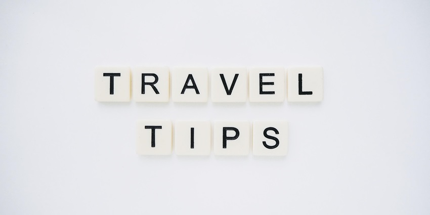 An image spelling 'TRAVEL TIPS' on background, suggesting helpful advice for travellers