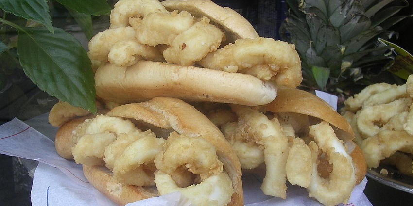 What is Madrid famous for? Includes A sandwich filled with crispy fried calamari rings