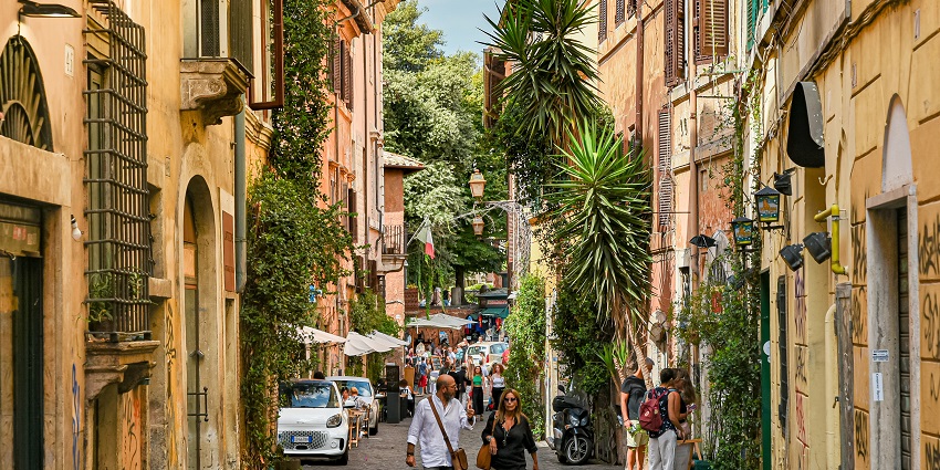A picture of a lively neighbourhood at Trastevere in Rome on a perfect sunny day.