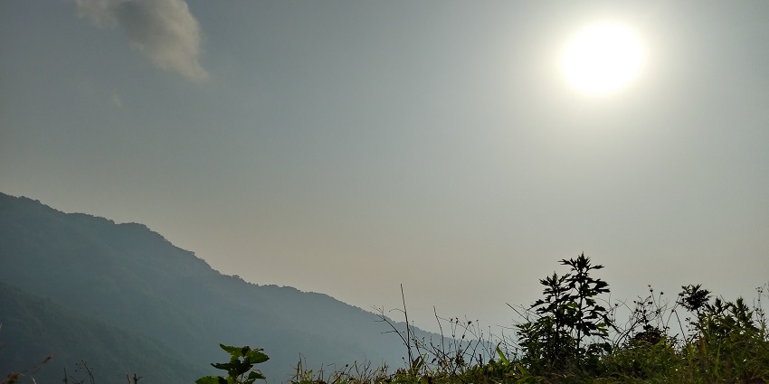 West Mawphanlur mountains in Meghalaya with big rocks, green trees and mountains.