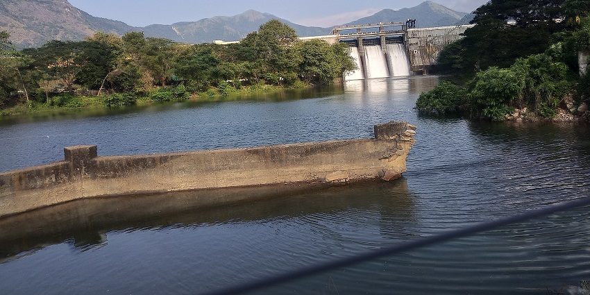 Expansive dam and reservoir surrounded by nature near Surat within 100 km.