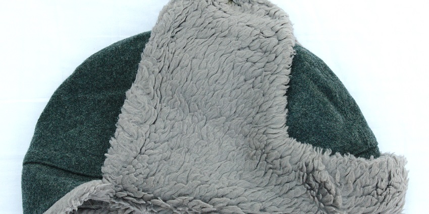 Stay warm in a fluffy ushanka hat with ear flaps, a traditional winter staple in Russian culture.