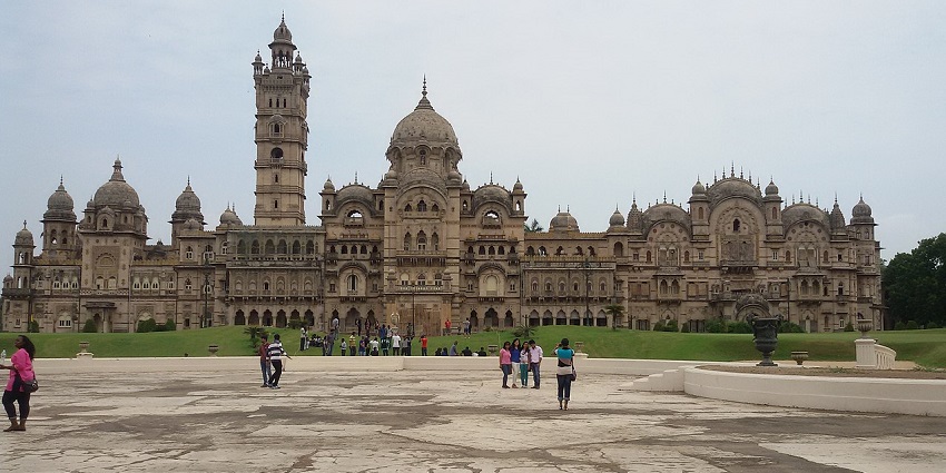 The grand Laxmi Vilas Palace in Vadodara gleams, surrounded by lush gardens, Gujarat