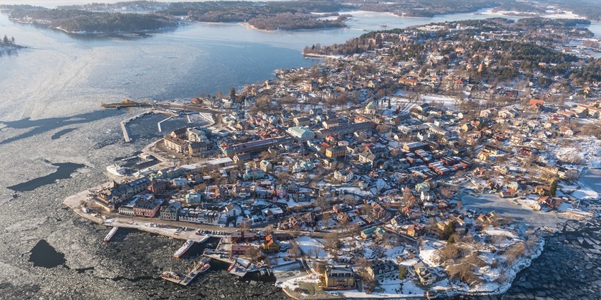 Wander cobblestone streets, visit the fortress, and enjoy waterside cafes in Vaxholm.