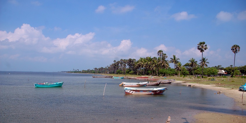 visitors exploring peaceful beaches and historical remnants on Velanai (Kayts) Island.