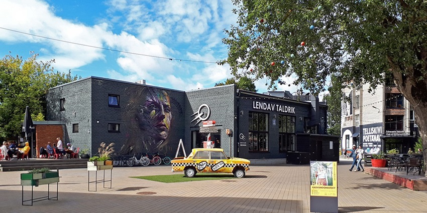 Explore a hipster neighborhood with trendy restaurants, boutiques, and the Balti Jaama Turg Market.