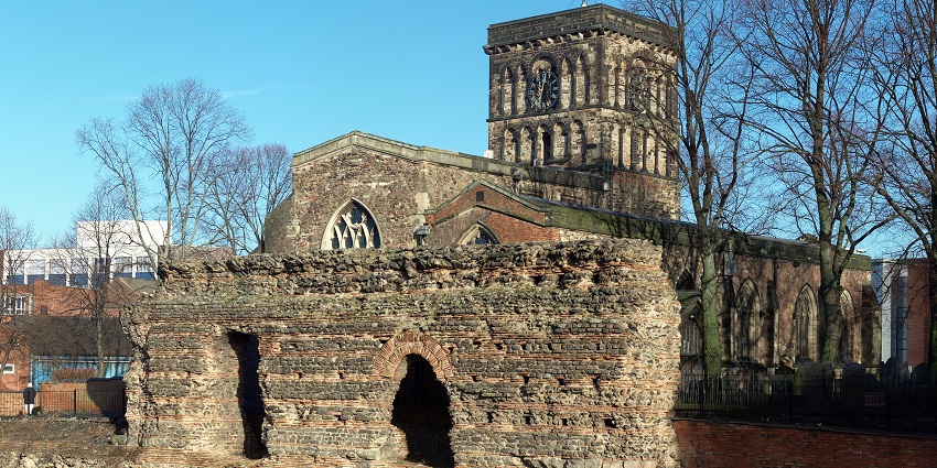 View of Roman bath ruins and medieval guild buildings that trace Leicester’s ancient past.