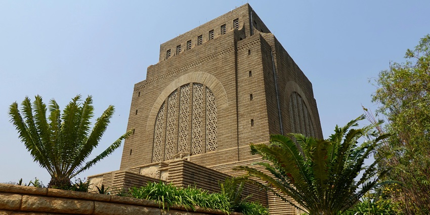 The Voortrekker Monument is on a grassy hill, one of the monuments in South Africa.