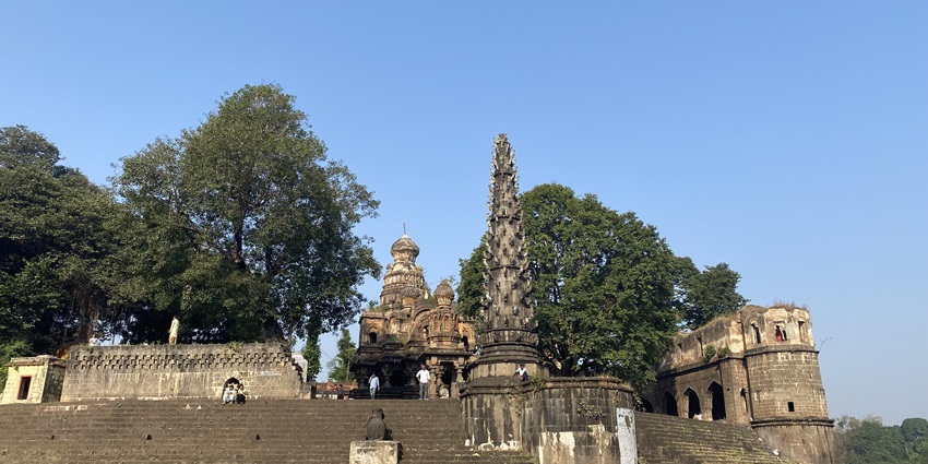 An image of a beautifully engraved temple structure with a soothing atmosphere.
