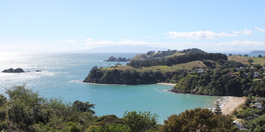 Sunlit beaches on scenic Waiheke Island near Auckland, among the best islands in New Zealand.