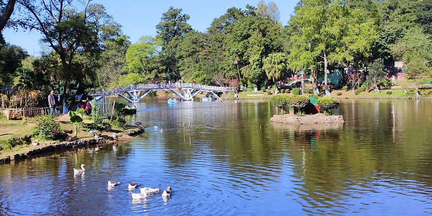 Ward's Lake in Shillong with a large water body and a white architectural bridge over the lake