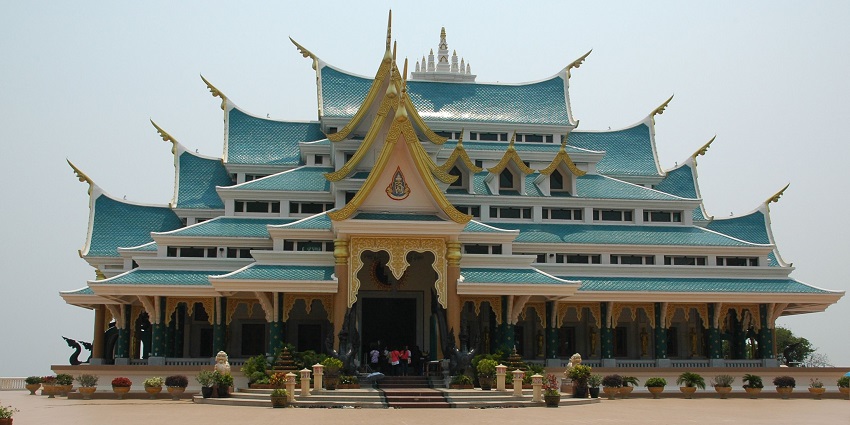 Wat Pa Phu Kon, withits traditional Thai architecture, cyan roofs, is one of the most stunning places to visit in Thailand in March.
