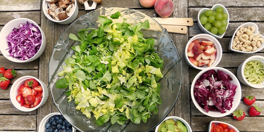 An image of fresh fruit and berry salad in a bowl, rich in vitamins and vibrant colours