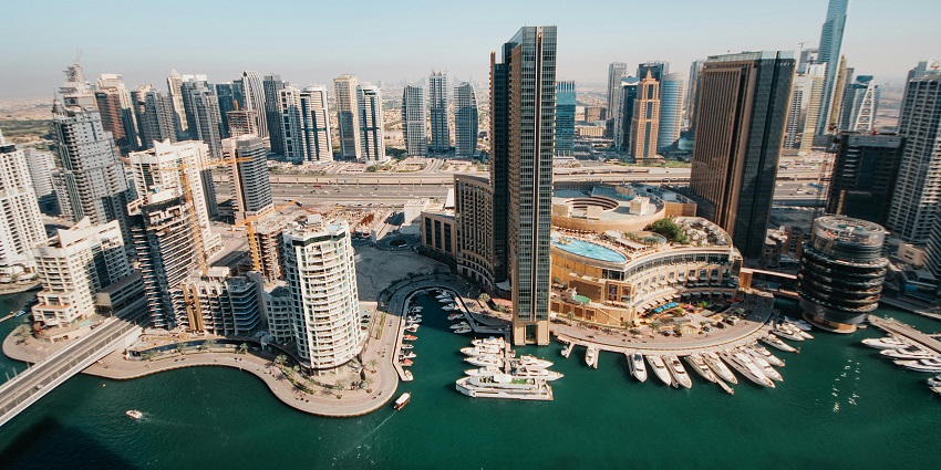 Zipline offering thrilling aerial views of skyscrapers and luxury yachts, one of the interesting things to do in Dubai Marina.