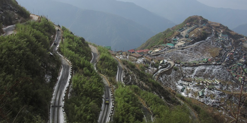 Winding mountain road with hairpin bends, a thrilling place to visit in Sikkim in August.