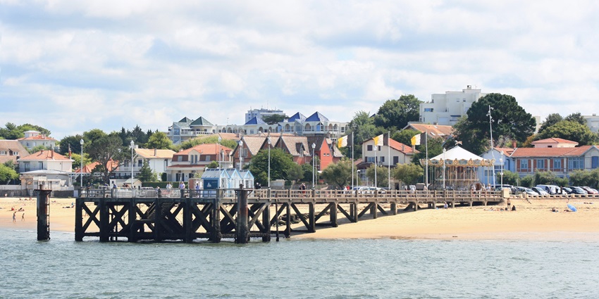 Scenic view of Arcachon Bay with calm waters and surrounding natural landscape.