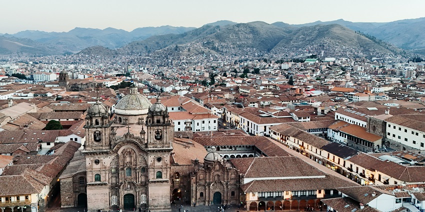 Scenic view of Atemajac De Brizuela town surrounded by hills and greenery.