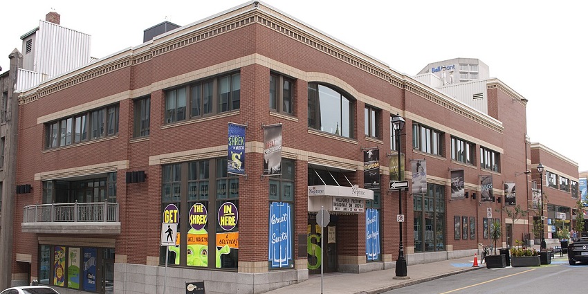Neptune Theatre exterior with marquee and entrance during the day.
