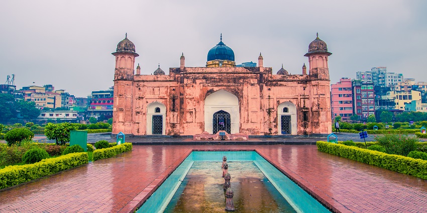 Lalbagh Fort in Dhaka, a historic Mughal-era structure with red-brick walls and gardens.
