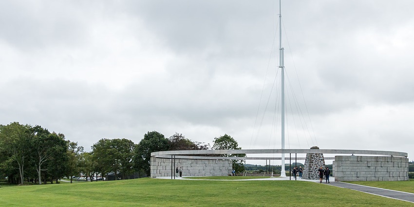 Historic Battle of Bannockburn scene with raised flag and open battlefield setting.