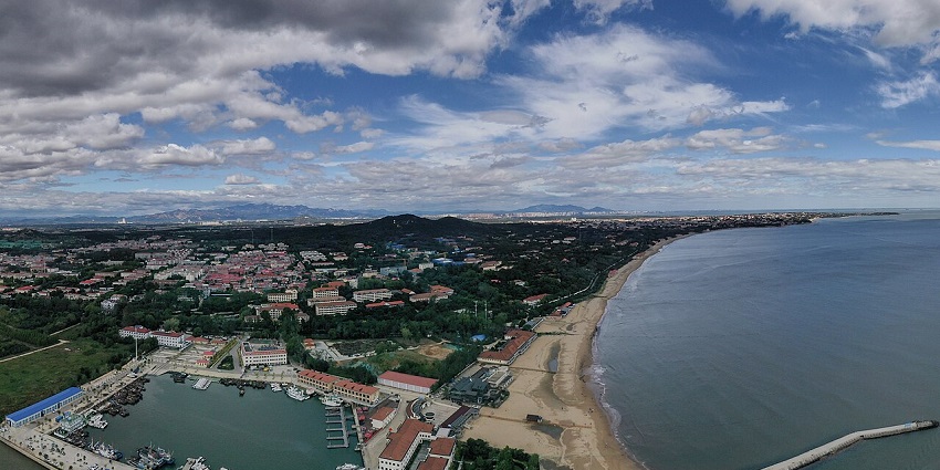Beidaihe coast with beaches and hills, a scenic gem among places to visit near Beijing.
