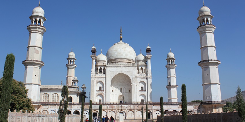 Wide view of Bibi Ka Maqbara with white domes, and minarets, one of the best places to visit near Ellora Caves.