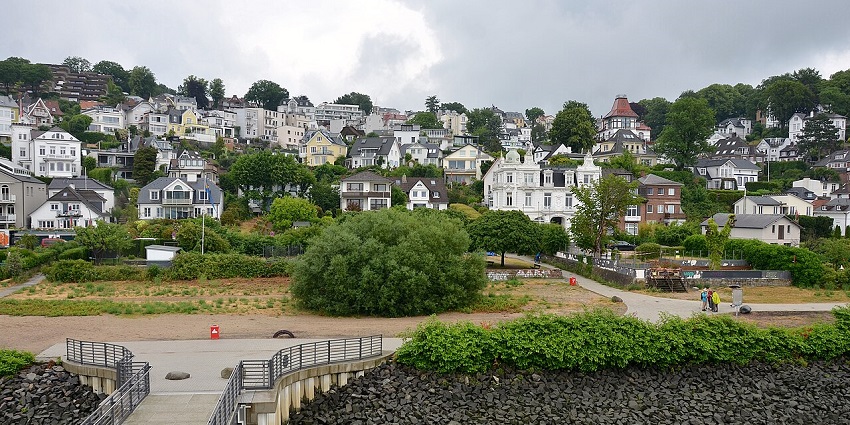 Scenic hillside view of Blankenese with stairways and houses by the Elbe River.