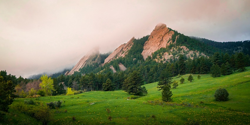 Scenic view of Boulder with Flatirons backdrop, one of the top places to visit near Denver.