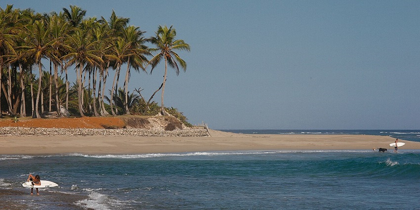 Cabarete Beach, one of the best beaches in the Dominican Republic for kiteboarding and surfing, offers golden sands and clear blue waters.