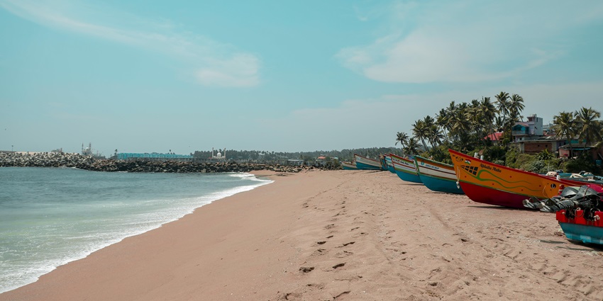Calangute Beach with a boat on the shore, one of the top places to visit in Goa near Mapusa.